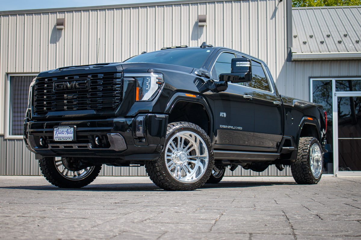 2024 GMC Sierra 2500 Denali Ultimate with a 3" Cognito leveling kit, 22x12 Stealth Forged Savage wheels, and 33" Versatyre HD Rugged Terrain tires.