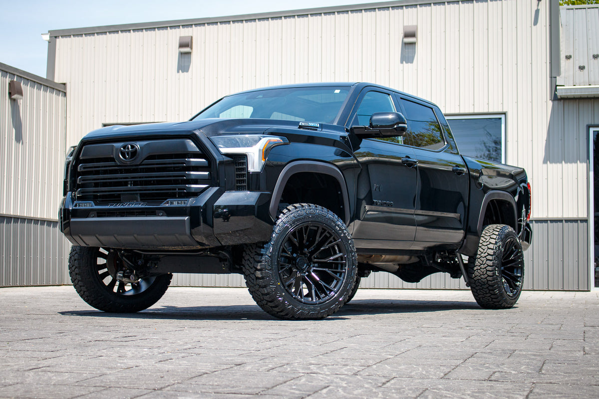 2025 Toyota Tundra Limited with a 6" Rough Country lift kit, 22x12 Fuel Rebar wheels, and 35" Fury Country Hunter R/T tires.