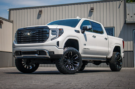 2025 GMC Sierra 1500 Denali Ultimate with a 6" Rough Country lift kit, 22x12 Fuel Rebar wheels, and 35" Fury Country Hunter R/T tires.