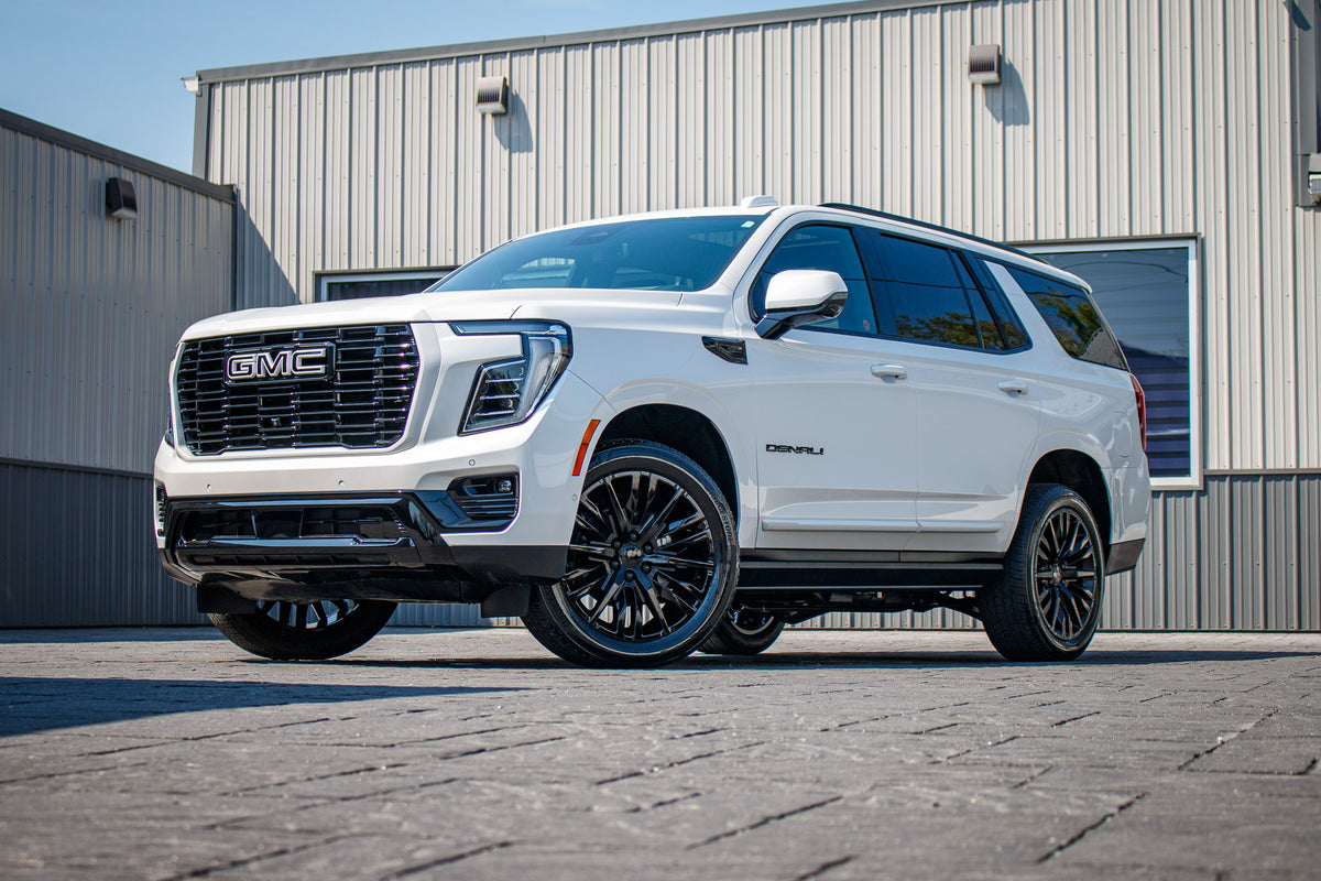 2025 GMC Yukon Denali with GMC Factory suspension, 22x9 GMC Stock wheels, and Bridgestone Alenza tires.