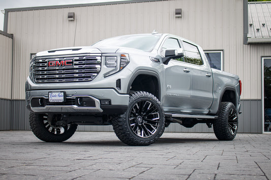 2025 GMC Sierra 1500 Denali with a 6" Rough Country lift kit, 22x12 Fuel Rebar wheels, and 35" Fury Country Hunter R/T tires.