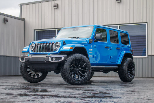 2024 Jeep Wrangler with a 2.5" Rough Country lift kit, 22x12 Fuel Rebar wheels, and 35" Fury Country Hunter R/T tires.