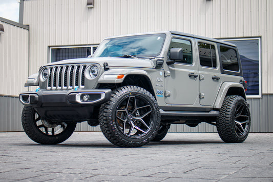 2022 Jeep Wrangler Unlimited Sahara 4XE with a 2.5" Rough Country lift kit, 22x12 Fuel Flux wheels, and 35" Fury Country Hunter R/T tires.