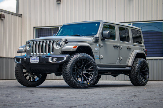 2023 Jeep Wrangler Unlimited Sahara 4XE with a 2.5" Rough Country lift kit, 22x12 Fuel Rebar wheels, and 35" Fury Country Hunter R/T tires.