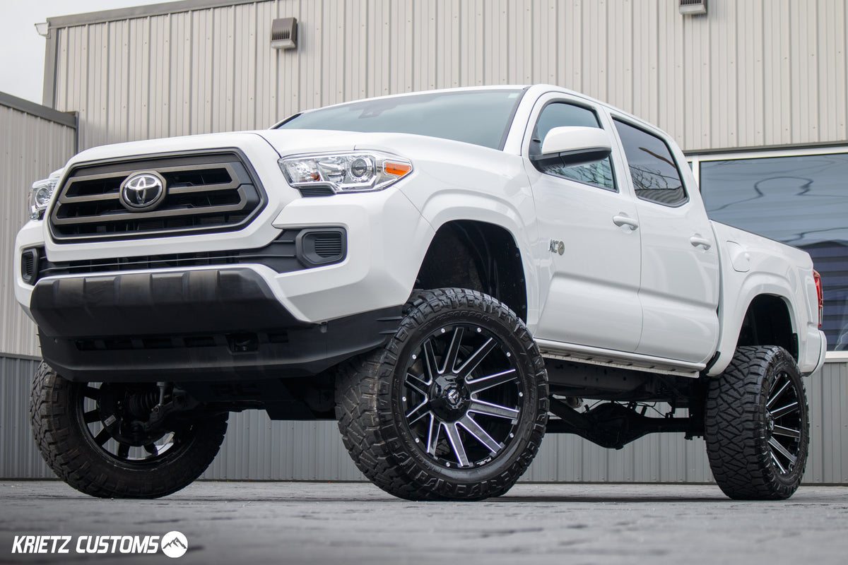 2020 Toyota Tacoma SR5 with a 6" Rough Country lift kit, 20x10 Fuel Contra wheels, and 33" Nitto Ridge Grappler tires.