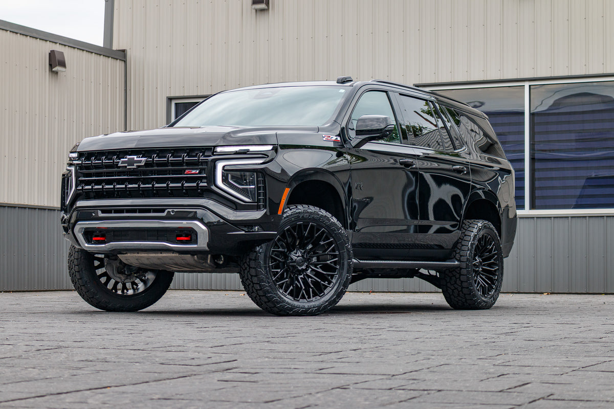 2025 Chevrolet Tahoe Z71 with a 3" ReadyLift lift kit, 22x10 Fuel Strike wheels, and 295/50 Toyo Open Country AT3 tires.