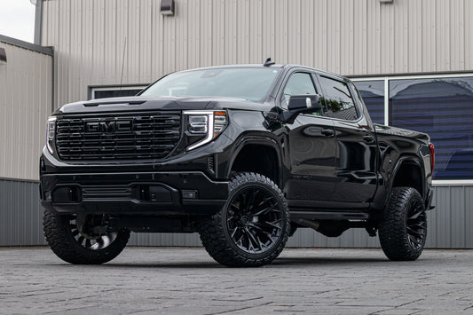 2025 GMC Sierra 1500 Denali Ultimate with a 6" Rough Country lift kit, 22x12 Fuel Flame, and 35" Fury Country Hunter R/T tires.