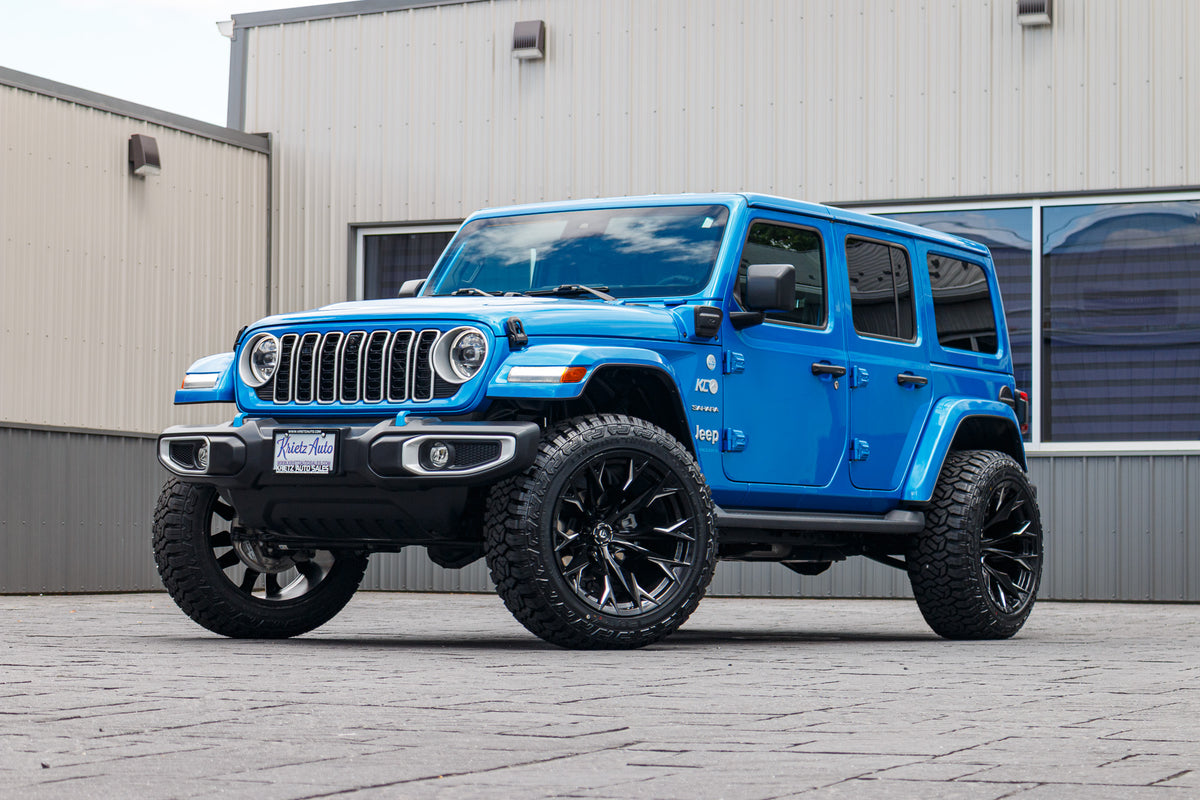2024 Jeep Wrangler Unlimited Sahara 4XE with a 2.5" Rough Country lift kit, 22x12 Fuel Flame wheels, and 35" Fury Country Hunter R/T tires.