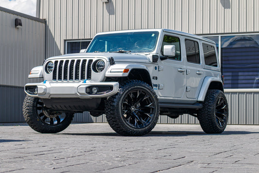2022 Jeep Wrangler Unlimited Sahara 4XE with a 2.5" Rough Country lift kit, 22x12 Fuel Flame wheels, and 35" Fury Rough Country R/T tires.