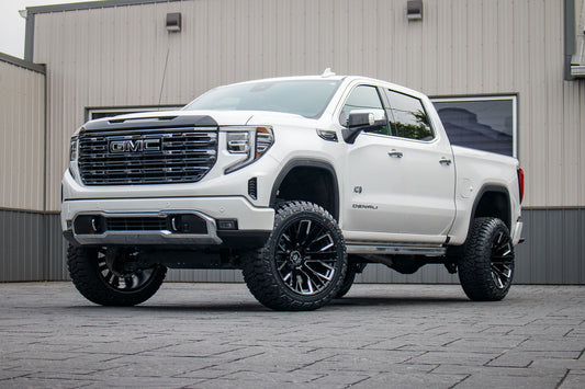2025 GMC Sierra 1500 Denali Ultimate with a 6" Rough Country lift kit, 22x12 Fuel Rebar wheels, and 35" Fury Country Hunter R/T tires.