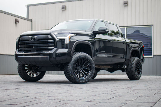 2024 Toyota Tundra Limited with a 6" Rough Country lift kit, 22x12 Fuel Rebar wheels, and 35" Fury Country Hunter R/T tires.