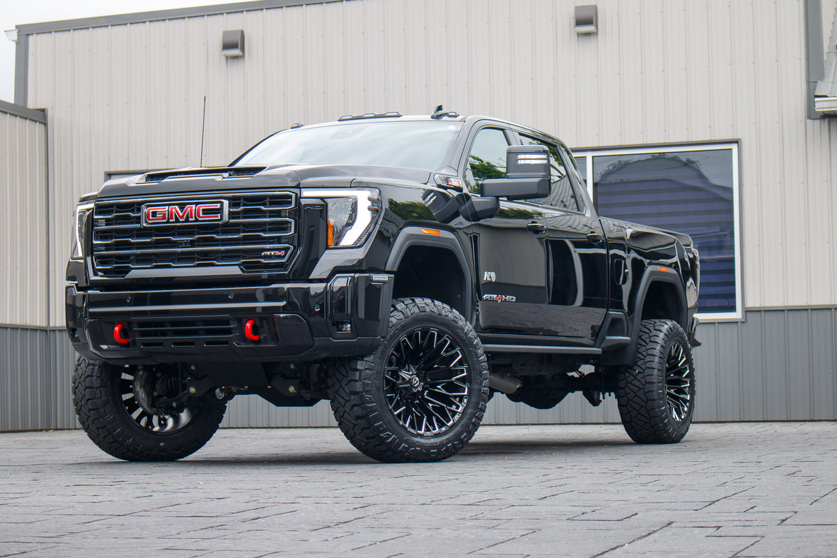 2025 GMC Sierra 2500 AT4 with a 5" BDS lift kit, 22x12 Fuel Strike wheels, and 37" Nitto Ridge Grappler tires.