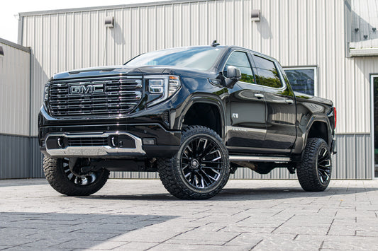 2025 GMC Sierra 1500 Denali Ultimate with a 6" Rough Country lift kit, 22x12 Fuel Rebar wheels, and 35" Fury Country Hunter R/T tires.