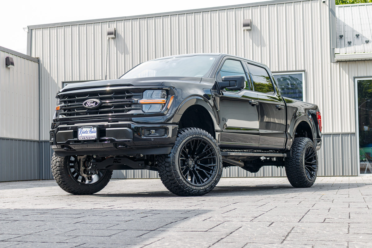 2024 Ford F-150 XLT with a 6" Rough Country Lift Kit, 22x12 Fuel Rebar wheels, and 35" Fury Country Hunter R/T tires.