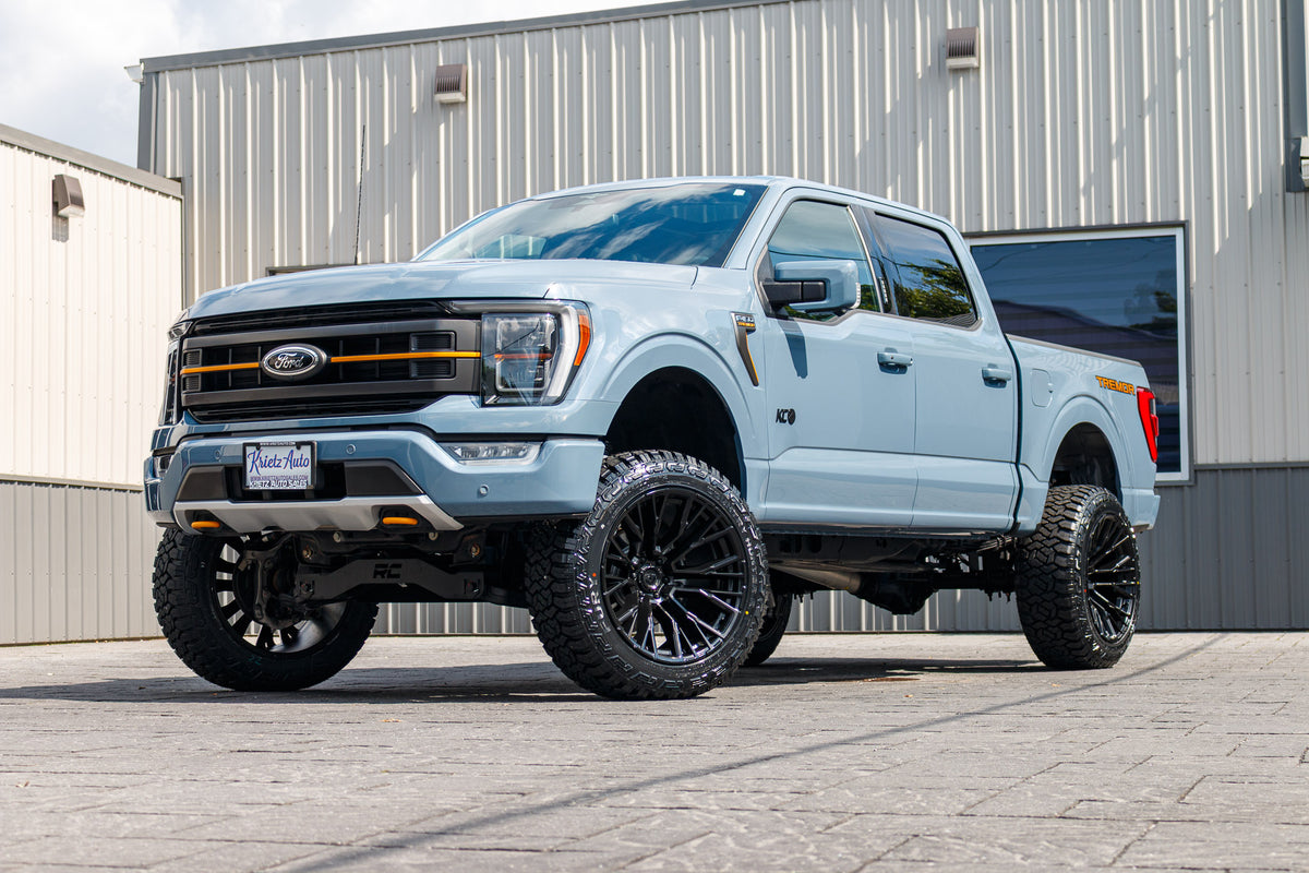 2023 Ford F-150 Tremor with a 6" Rough Country lift kit, 22x12 Fuel Rebar wheels. and 35" Fury Country Hunter R/T tires.