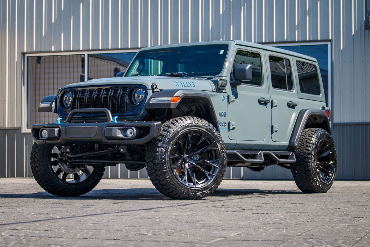 2024 Jeep Wrangler Unlimited Sahara 4XE with a 2.5" Rough Country lift kit, 22x12 Fuel Flame wheels, and 35" Fury Country Hunter R/T tires.