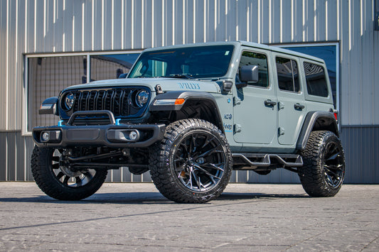 2024 Jeep Wrangler Unlimited Sahara 4XE with a 2.5" Rough Country lift kit, 22x12 Fuel Flame wheels, and 35" Fury Country Hunter R/T tires.