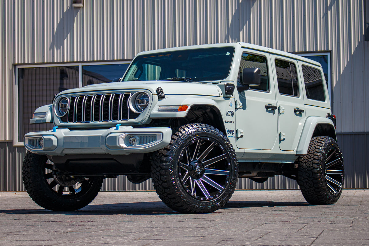 2024 Jeep Wrangler Unlimited Sahara 4XE with a 2.5" Rough Country lift kit, 22x12 Fuel Contra wheels, and 35" Fury Country Hunter R/T tires.