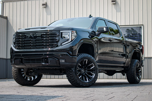 2025 GMC Sierra 1500 Denali Ultimate with a 6" Rough Country lift kit, 22x12 Fuel Rebar wheels, and 35" Fury Country Hunter R/T tires.