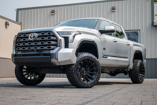 2024 Toyota Tundra Platinum with a 6" Rough Country lift kit, 22x12 Fuel Burn wheels, and 35" Fury Country Hunter R/T tires.