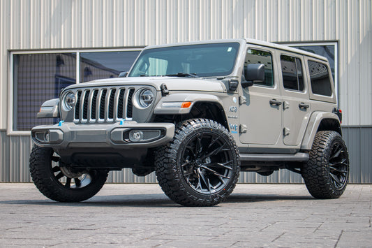 2022 Jeep Wrangler Unlimited Sahara 4XE with a 2.5" Rough Country lift kit, 22x12 Fuel Flame wheels, and 35" Fury Country Hunter R/T tires.