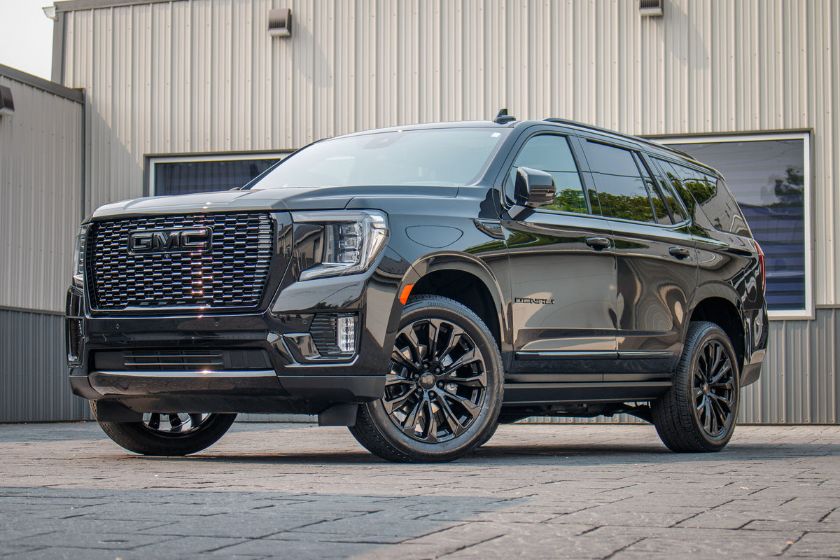 2024 GMC Yukon Denali with GMC Stock suspension, 22x9 GMC Stock wheels, and 285/55 Bridgestone Alenza tires.