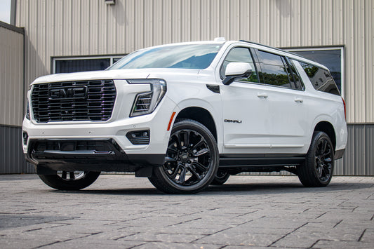 2025 GMC Yukon XL Denali with GMC Factory suspension, 22x9 GMC Stock wheels, and Bridgestone Alenza tires.