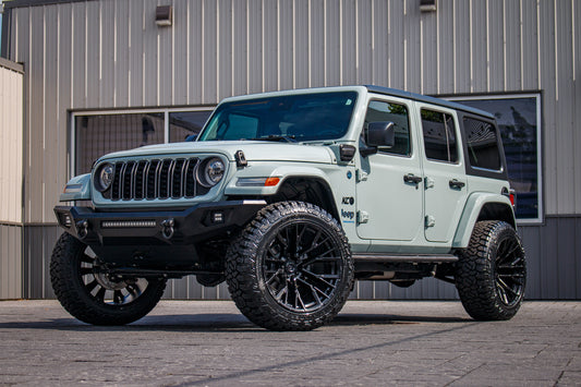 2024 Jeep Wrangler Unlimited Sahara 4XE with a 2.5" Rough Country lift kit, 22x12 Fuel Rebar wheels, and 35" Country Hunter R/T tires.