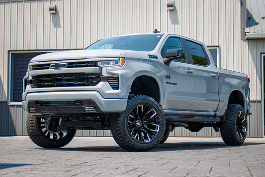 2024 Chevrolet Silverado 1500 RST with a 6" Rough Country lift kit, 22x12 Fuel Rebar wheels, and 35" Fury Country Hunter R/T tires.