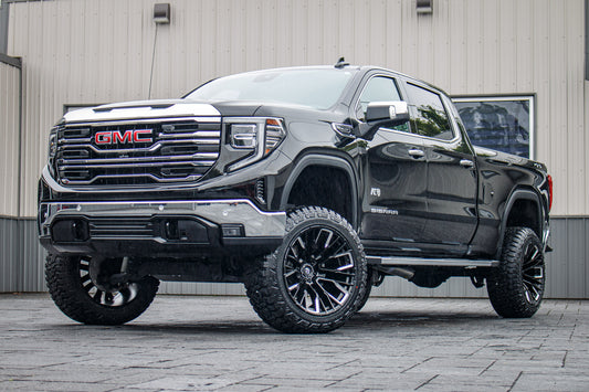 2024 GMC Sierra 1500 SLT with a 6" Rough Country lift kit, 22x12 Fuel Rebar wheels, and 35" Fury Country Hunter R/T tires.
