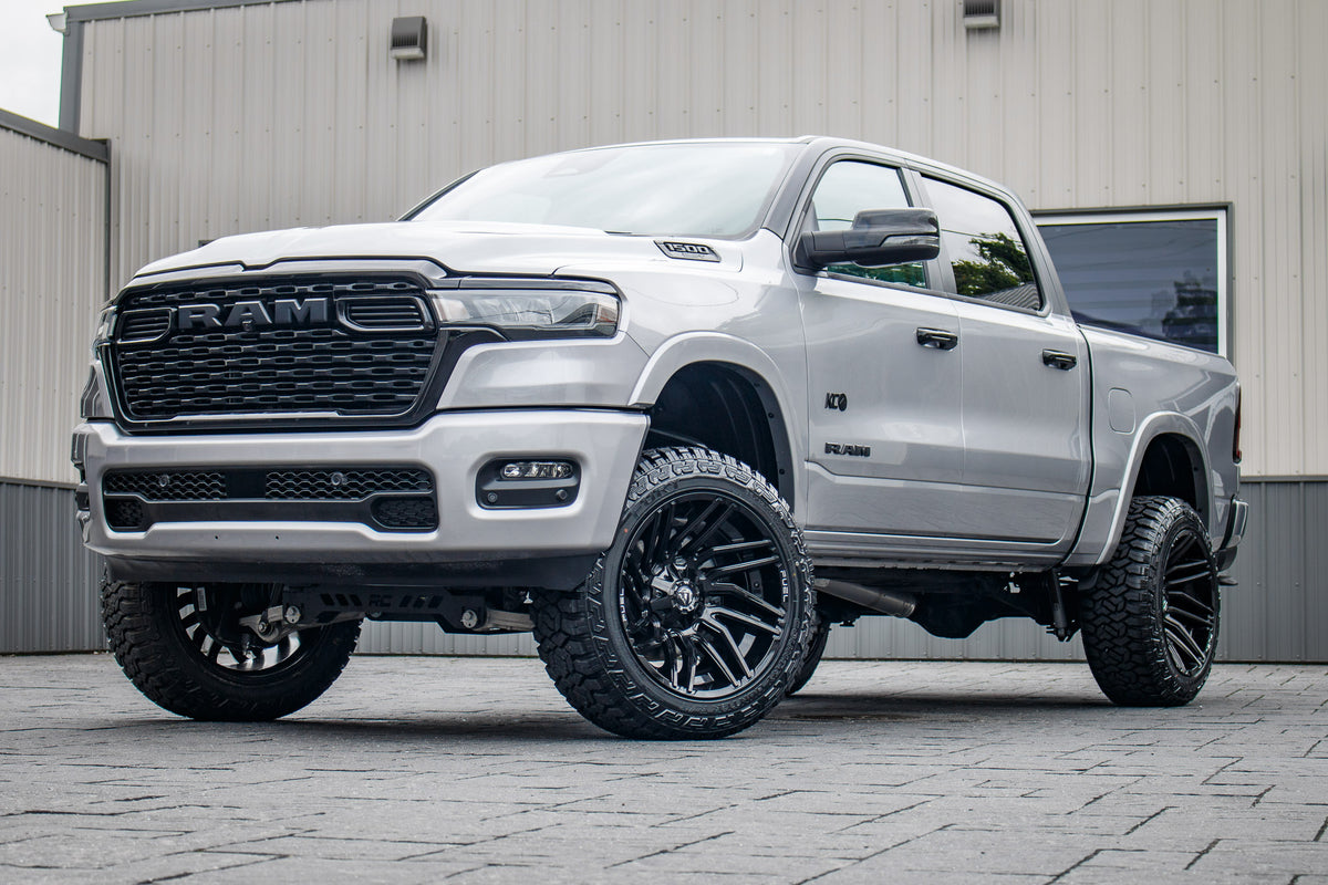 2025 Ram 1500 Lone Star with a 6" Rough Country lift kit, 22x12 Fuel Typhoon wheels, and 35" Fury Country Hunter R/T tires.