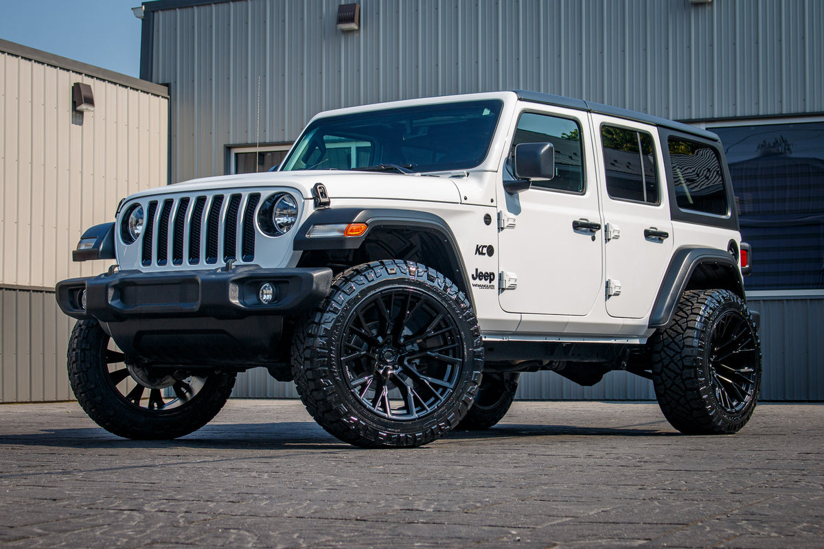 2021 Jeep Wrangler Unlimited Sport S White with 2.5 inch rough country lift kit, 22x12 Fuel Rebar wheels and 35 inch nitto ridge grappler tires