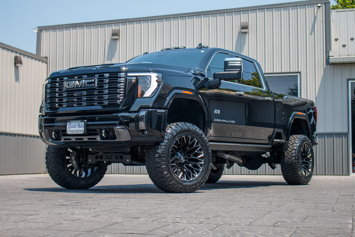2024 GMC Sierra 2500 Denali Ultimate Black with 5 inch NTD lift kit and 22x12 Fuel Strike wheels and 35 inch Nitto Ridge Grappler Tirees