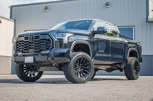 2025 Toyota Tundra Limited with a 6" Rough Country lift kit, 22x12 Fuel Rebar wheels, and 35" Avix Trailtek R/T tires.