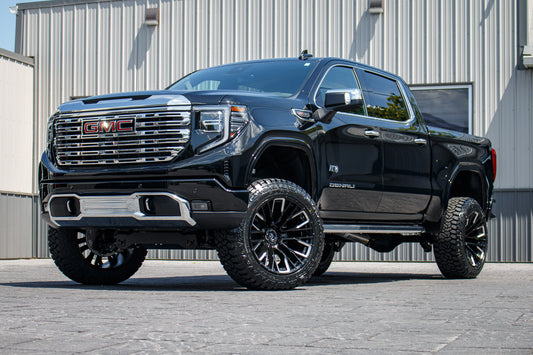 2024 GMC Sierra 1500 Denali Black with 6 inch Rough Country Lift kit and 22x12 Fuel Rebar Wheels and 35 Inch Fury Country Hunter R/T Tires