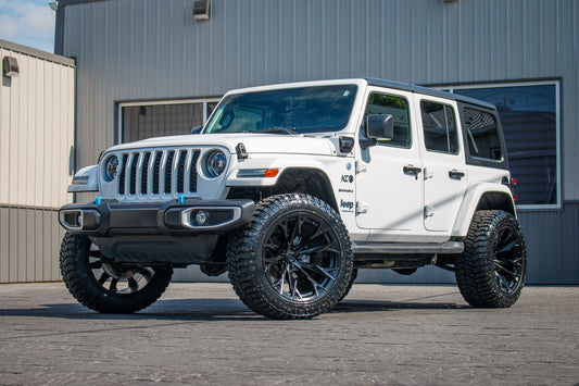 2023 Jeep Wrangler Unlimited Sahara 4XE with a 2.5" Rough Country lift kit, 22x12 Fuel Flame wheels, and 35" Avix Trailtek R/T tires.