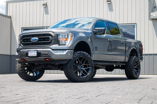 2023 Ford F-150 XLT Gray woth 6 inch Rough Country lift kit and 22x12 Fuel Flux wheels and 35 inch Nitto Ridge Grappler Tires