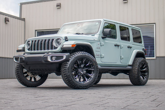 2024 Jeep Wrangler Unlimited Sahara with a 2.5" Rough Country lift kit, 22x12 Fuel Flame wheels, and 35" Avix Trailtek R/T tires.