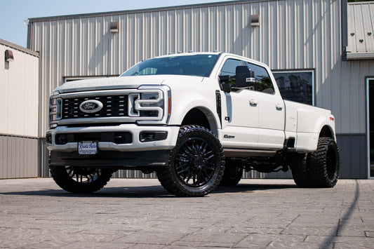 2025 Ford F-450 Super Duty XLT with a 3.5" ReadyLift lift kit, 24x8.25 XM Offroad XF-240 wheels, and 24x8.25 RoadOne Aethon M/T tires.
