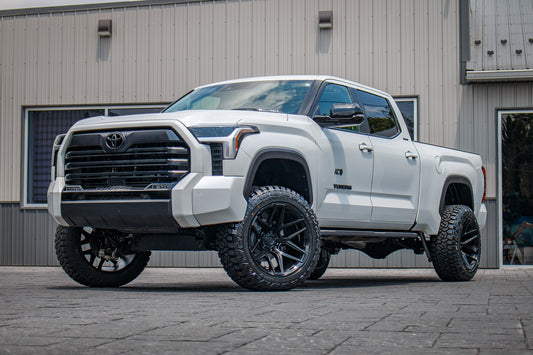 2024 Toyota Tundra Limited with a 6" Rough Country lift kit, 22x12 Fuel Flux wheels, and 35" Fury Country Hunter R/T tires.