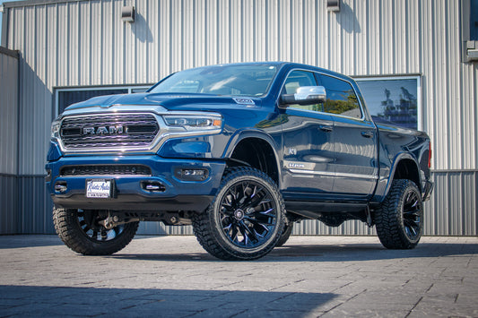 2024 Ram 1500 Limited with a 5" Rough Country lift kit, 22x12 Fuel Flame wheels, and 35" Avix Trailtek R/T tires.