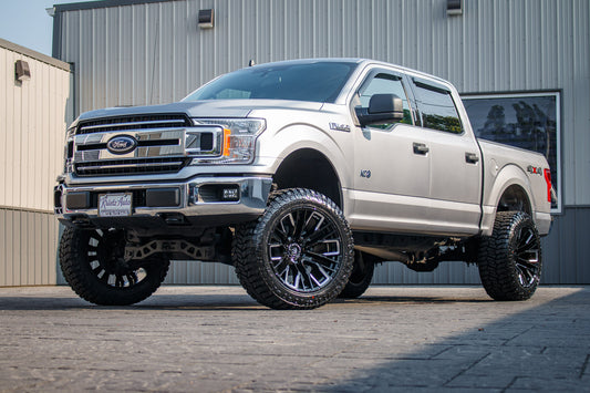 2020 Ford F-150 XLT with a 6" Rough Country lift kit, 22x12 Fuel Rebar wheels, and 35" Avix Trailtek R/T tires.