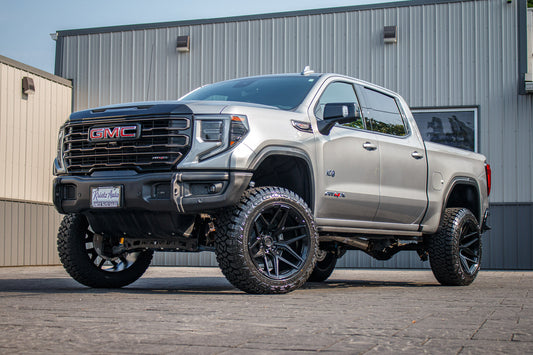 2024 GMC Sierra 1500 AT4X with a 6" ReadyLift lift kit, 22x12 Fuel Flux wheels, and 35" Fury Country Hunter R/T tires.