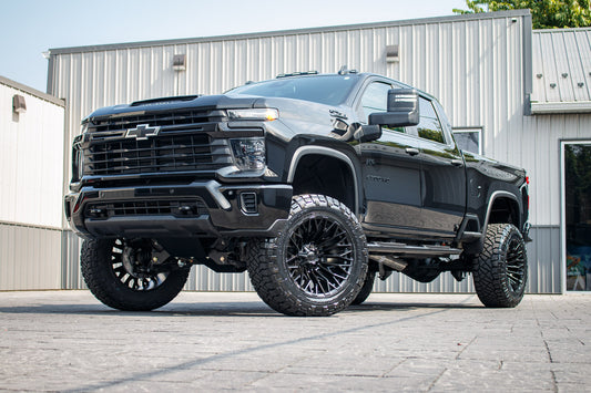 2025 Chevrolet Silverado 2500 Custom with a 5" BDS lift kit, 22x12 Fuel Strike wheels, and 37" Nitto Ridge Grappler tires.