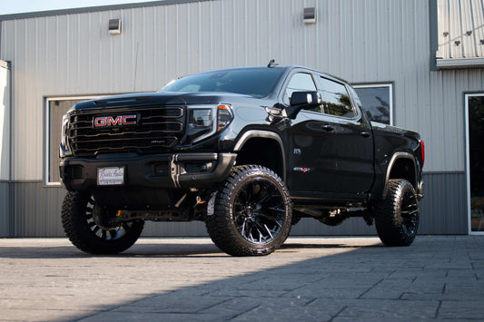 2024 GMC Sierra 1500 AT4X with a 6" ReadyLift lift kit, 22x12 Fuel Flame wheels, and 35" Fury Country Hunter R/T tires.