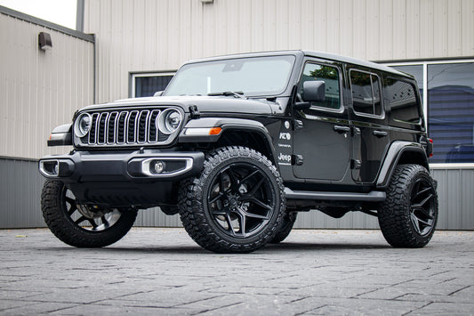 2024 Jeep Wrangler Sahara with a 2.5" Rough Country lift kit, 22x12 Fuel Flux wheels, and 35" Fury Country Hunter R/T tires.