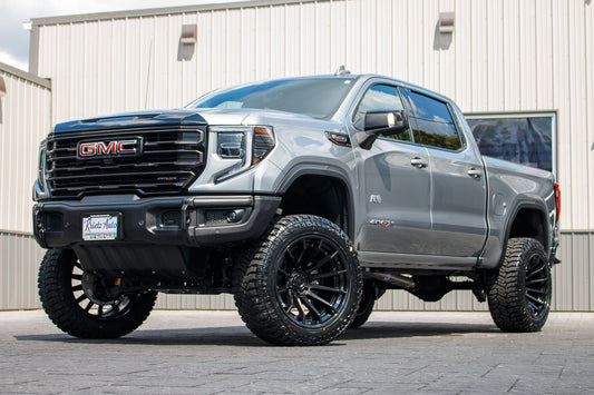 2025 GMC Sierra 1500 AT4X with a 4" ReadyLift kift kit, 22x12 Fuel Burn wheels, and 35" Avix Trailtek tires.