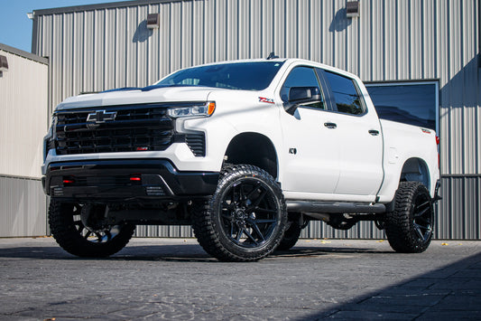 2024 Chevrolet Silverado 1500 LT Trail Boss with a 6" Rough Country lift kit, 22x12 Fuel Flux wheels, and 35" Avix Trailtek R/T tires.