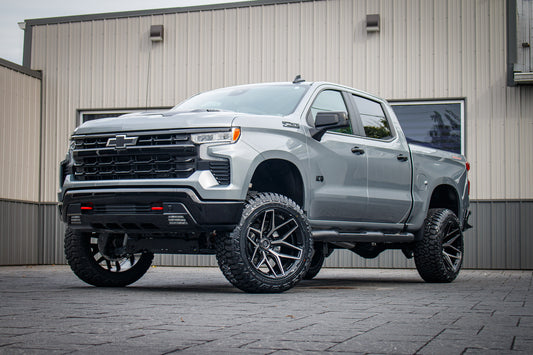 2025 Chevrolet Silverado 1500 LT Trail Boss with a 6" Rough Country lift kit, 22x12 Fuel Flux wheels, and 35" Fury Country Hunter R/T tires.