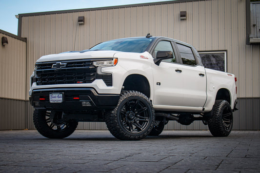 2024 Chevrolet Silverado 1500 LT Trail Boss 6" Rough Country lift kit, 22x12 Fuel Brawl wheels, and 35" Fury Country tires.